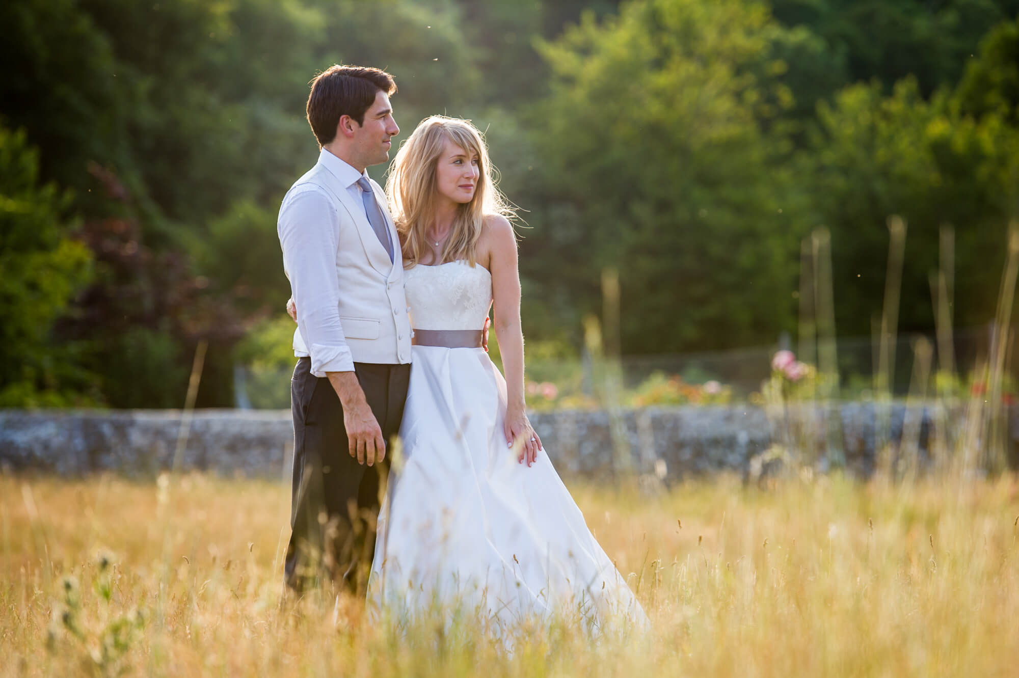 A couple having their wedding photography taken in the Sussex countryside 