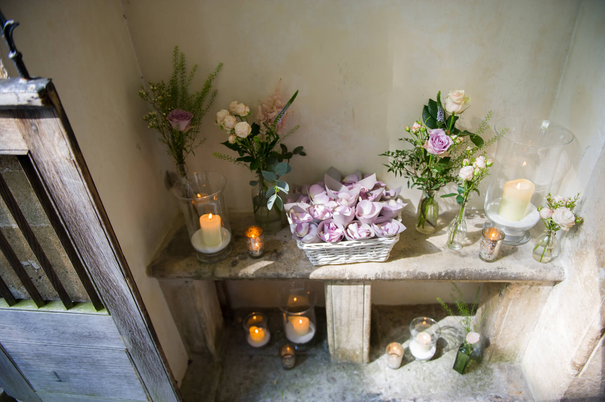 confetti and candles outside the chapel at babington house