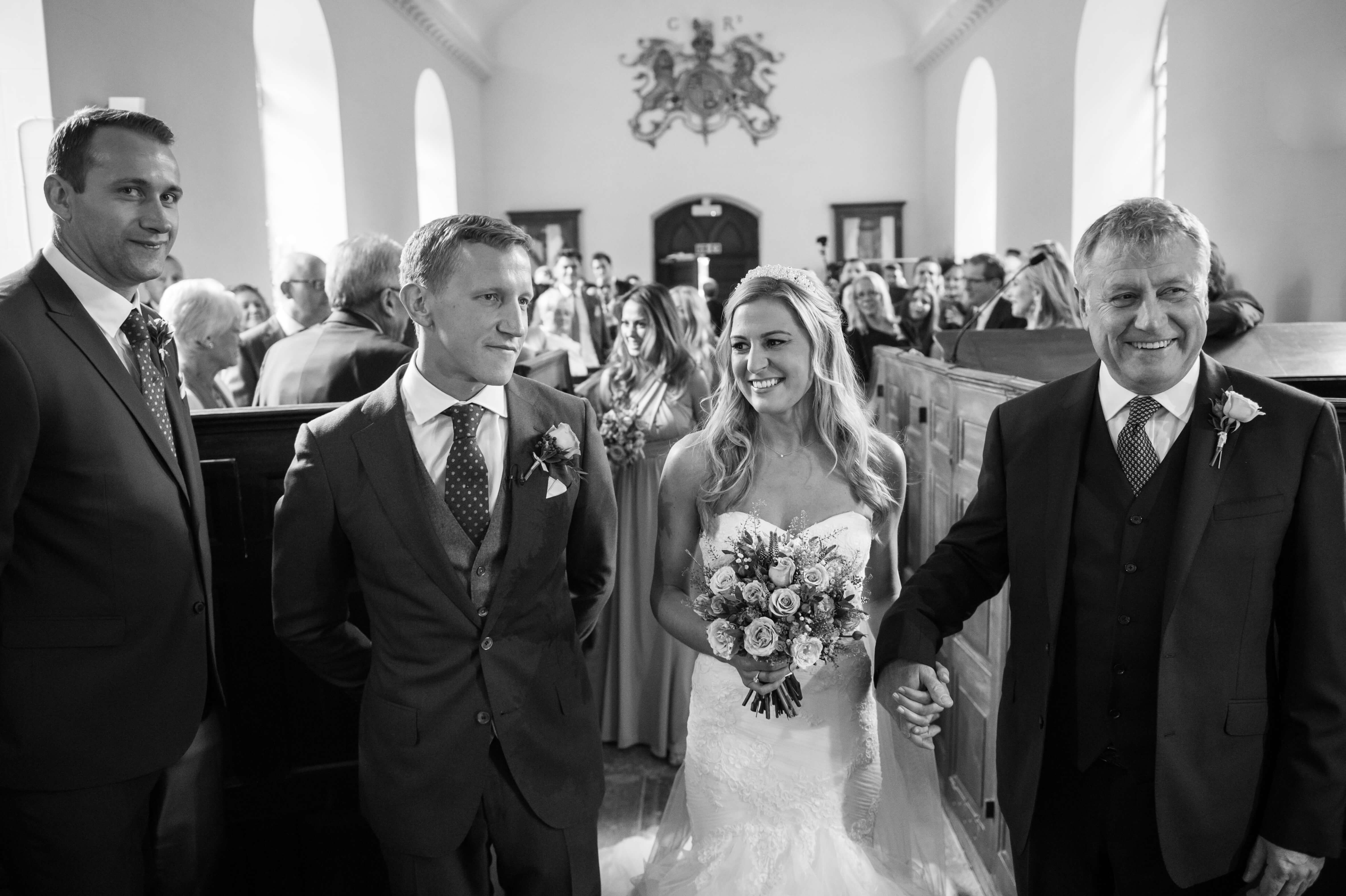 bride entering the chapel at babington house in somerset photographed by especially amy wedding photographer