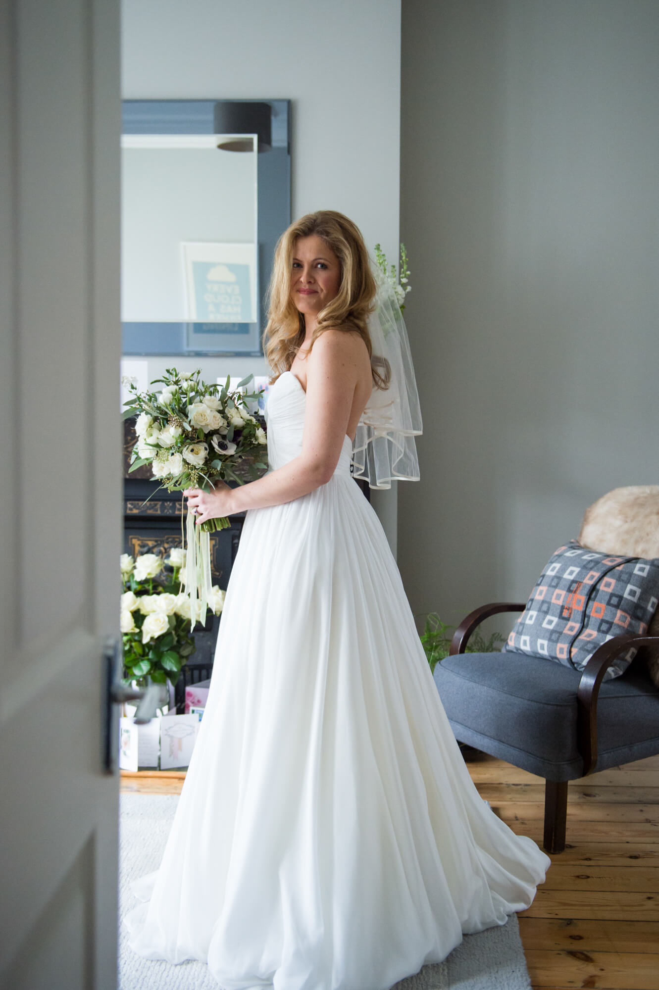 bride ready to go to church wearing naomi neoh gown picture taken by especially amy wedding photography