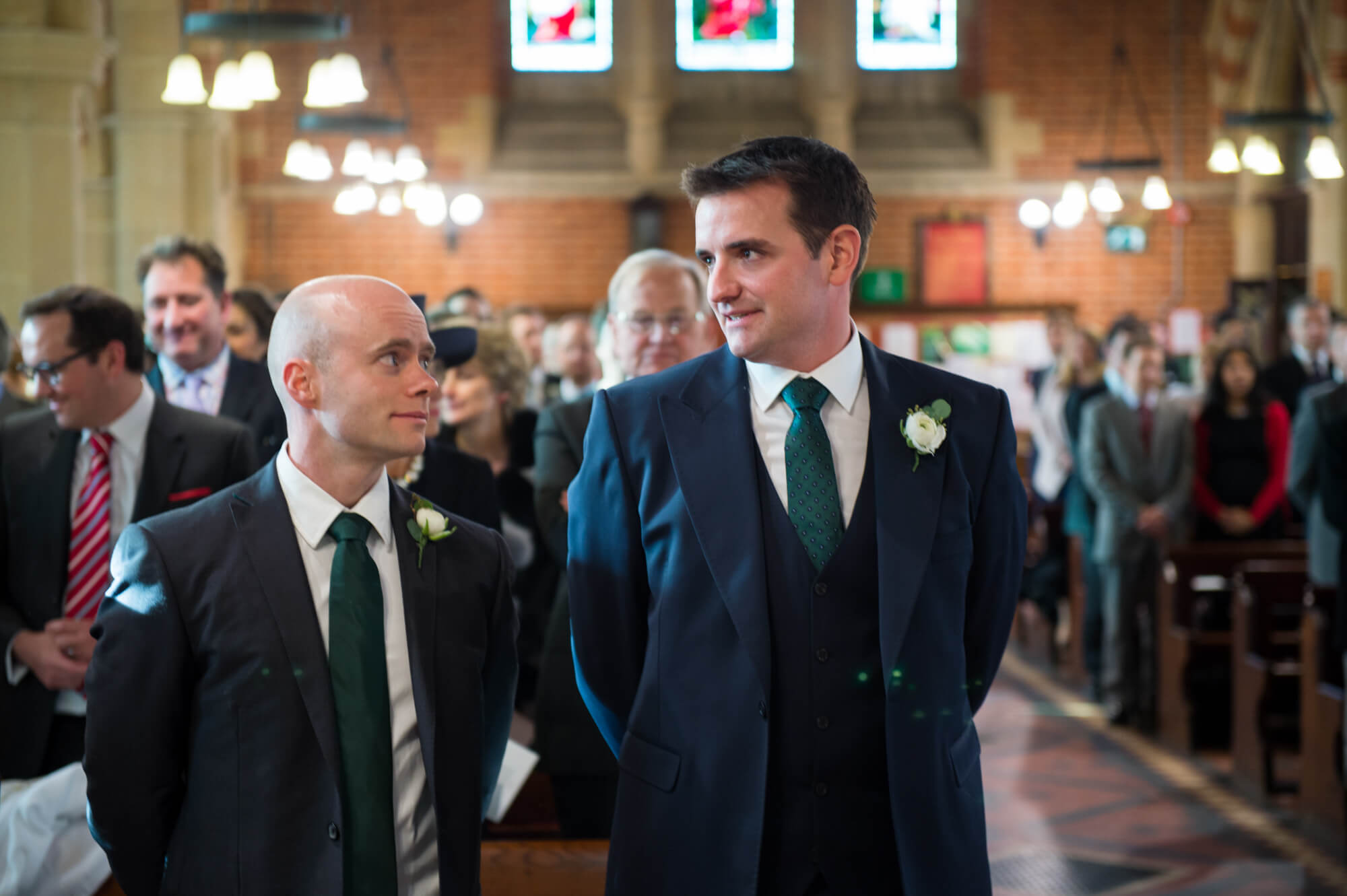 groom waiting with best man at st marys church in putney by especially amy london wedding photographer