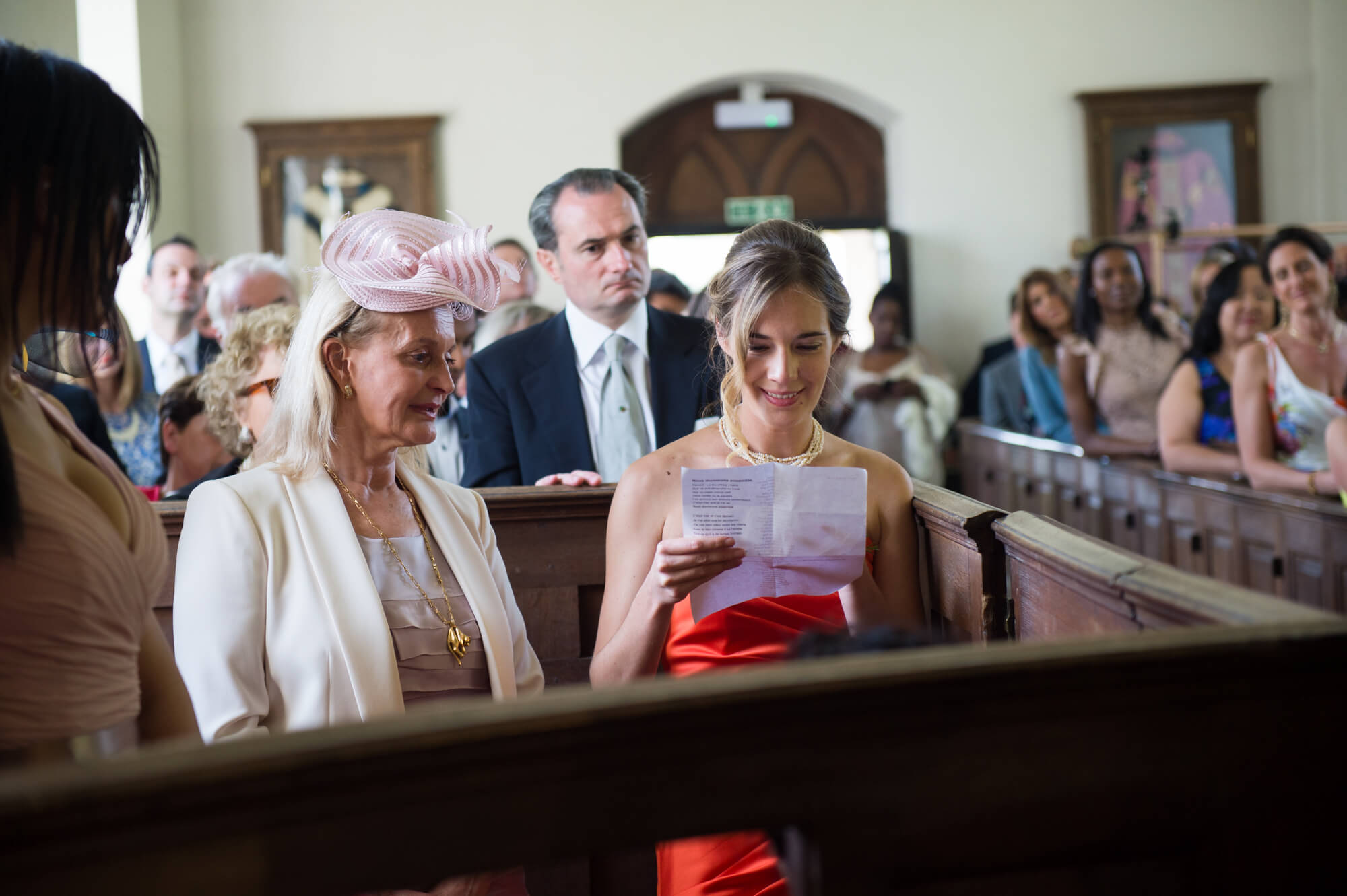 guest reading during wedding ceremony at babington house