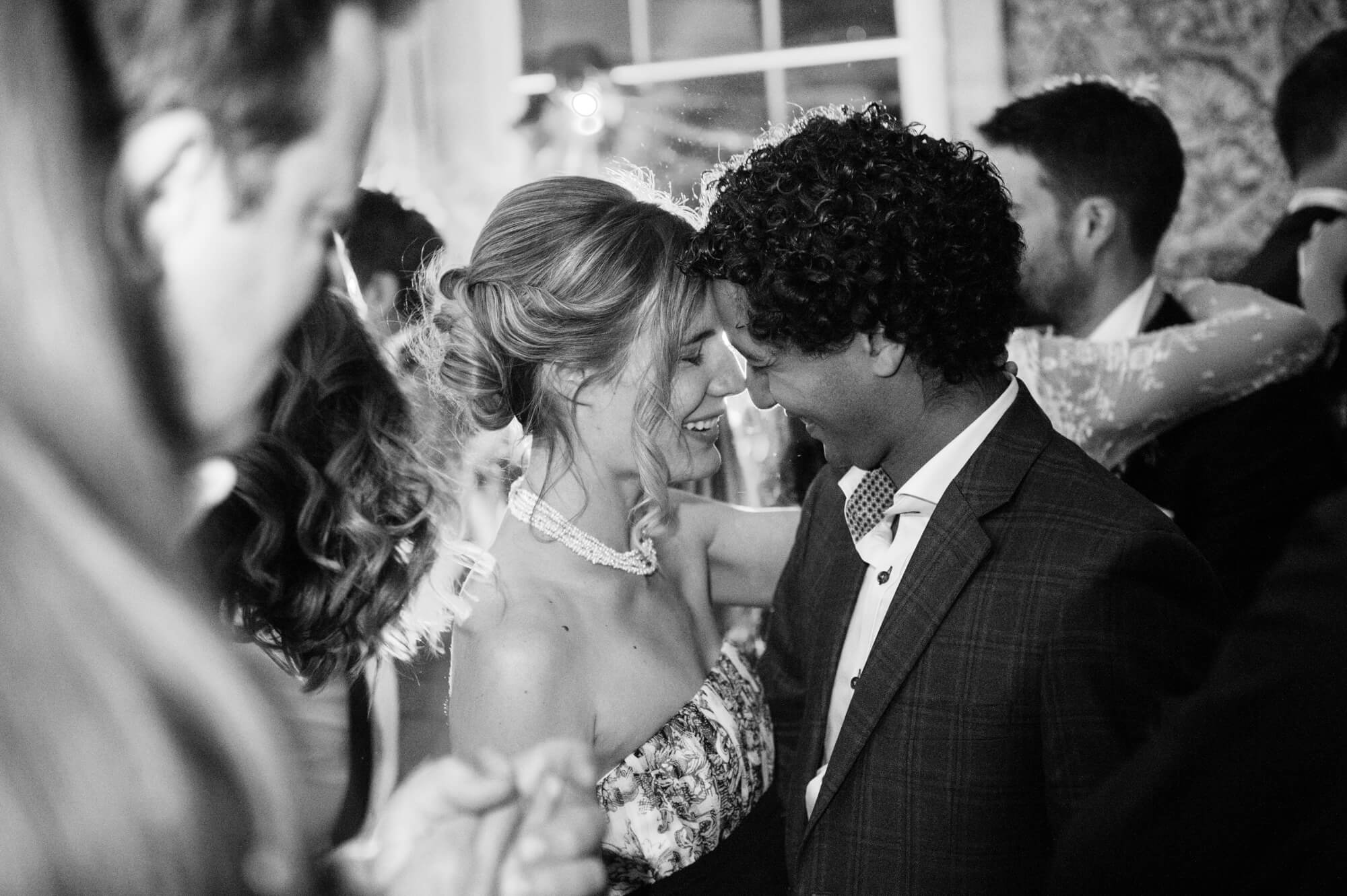 guests dancing at babington house wedding in the bar