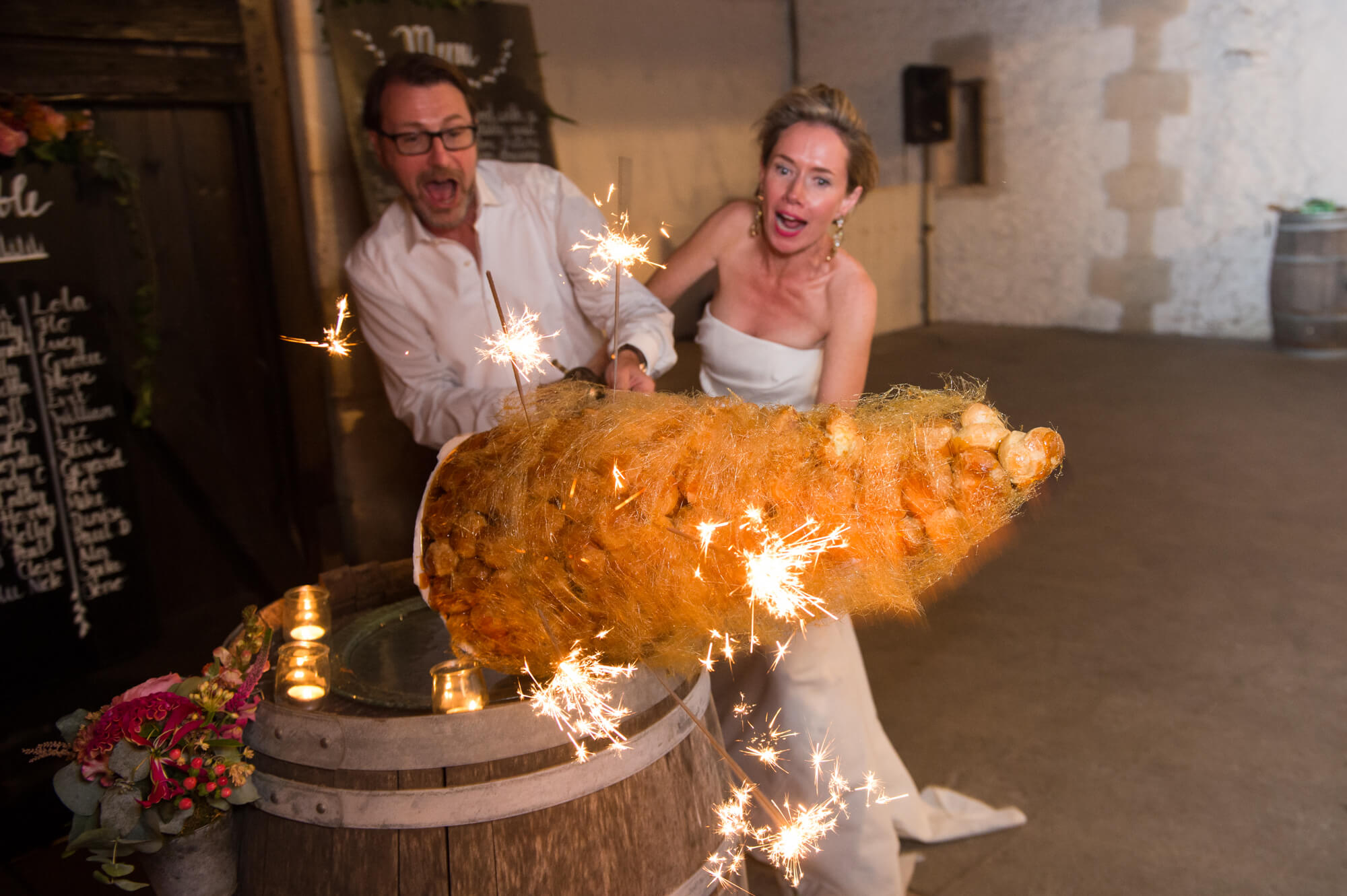 A photograph of a wedding cake toppling over at Chateau Rigaud