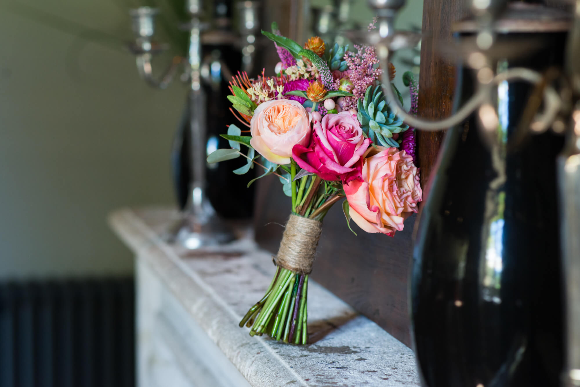 A bouquet of pink and peach roses at chateau rigaud